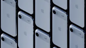 A repeating pattern of white iphones on a black background.